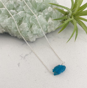 Custom healing motivator necklace from Justicia Jewelry with blue apatite