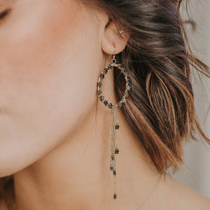 Custom healing hematite shoulder duster earrings from Justicia Jewelry