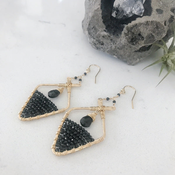 Custom healing moon earrings from Justicia Jewelry with black spinel