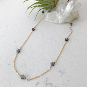 Custom healing star gazer necklace from Justicia Jewelry