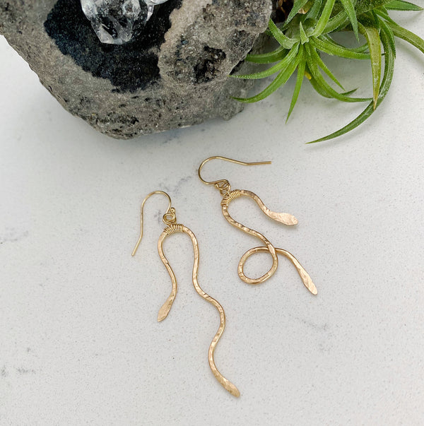 Custom healing serpent earrings from Justicia Jewelry