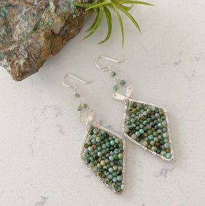 Custom healing arrowhead earrings from Justicia Jewelry