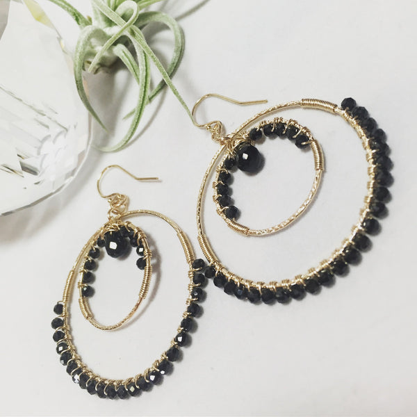 Custom healing moon earrings from Justicia Jewelry in black spinel