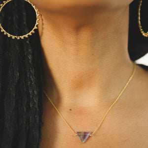Custom healing divinity necklace with rainbow fluorite from Justicia Jewelry on model