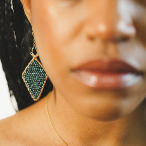 Custom healing arrowhead earrings from Justicia Jewelry with Malachite