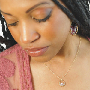 Custom healing emotions necklace from Justicia  Jewelry on model